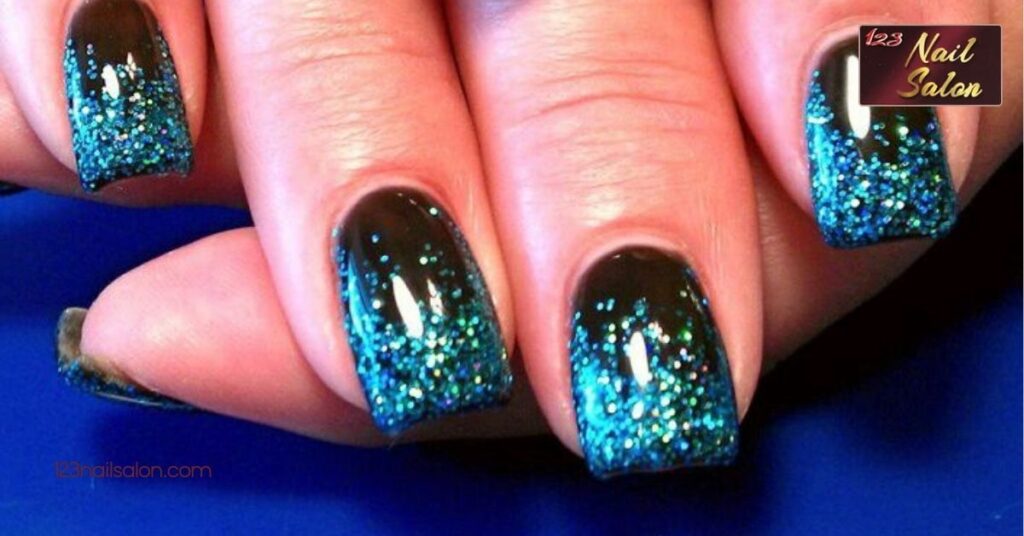30 Stunning Blue and Black Nail Ideas That Will Elevate Your Style Instantly 9 Blue And Black Glitter Accent Nails