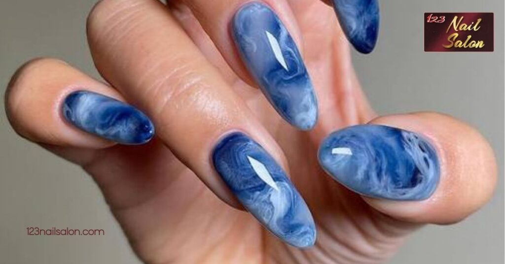 20 Stunning Blue Nail Ideas to Elevate Your Style All Year Round 6 Blue Marble Effect
