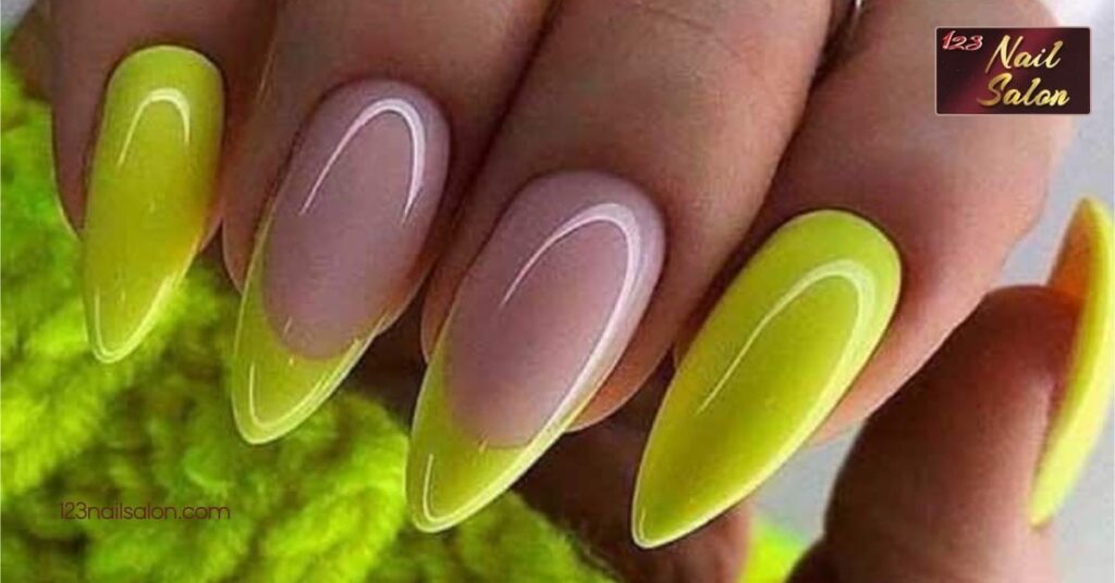 30 Stunning Yellow Nail Ideas to Brighten Up Your Style All Year Round 2 Bright Neon Yellow Designs