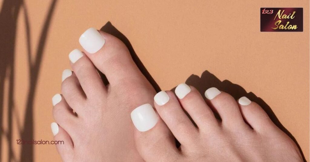 10 Trendy Summer Toenail Ideas to Make Your Feet Shine This Season 4 Classic Whites and Neutrals