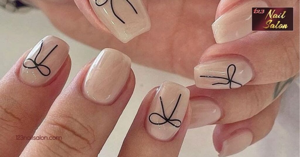 20 Charming Bow Nail Art Ideas to Elevate Your Manicure Game 1 Creative Bow Nail Art Ideas