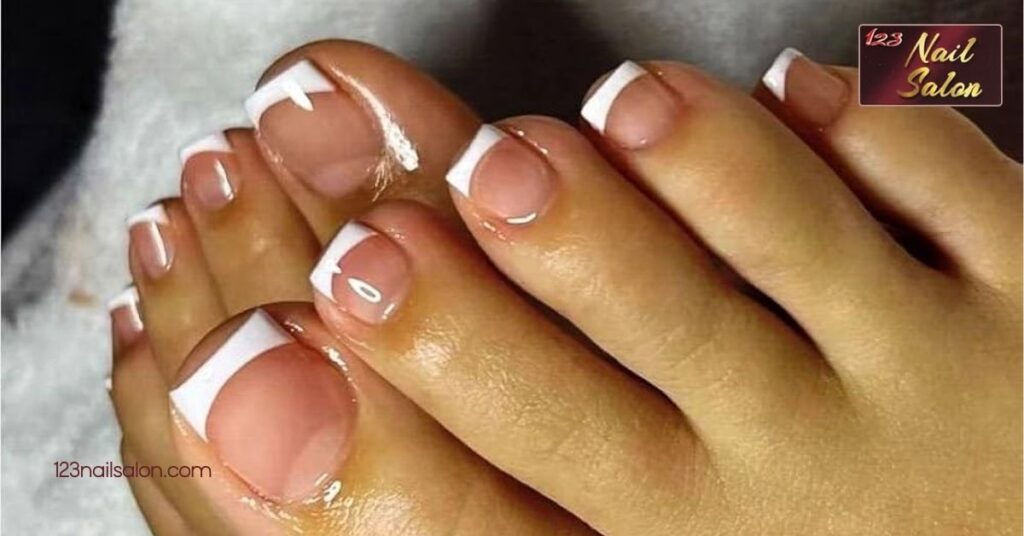 10 Stunning Toe Nail Art Ideas to Elevate Your Summer Pedicure Style 8 French Tips with a Twist