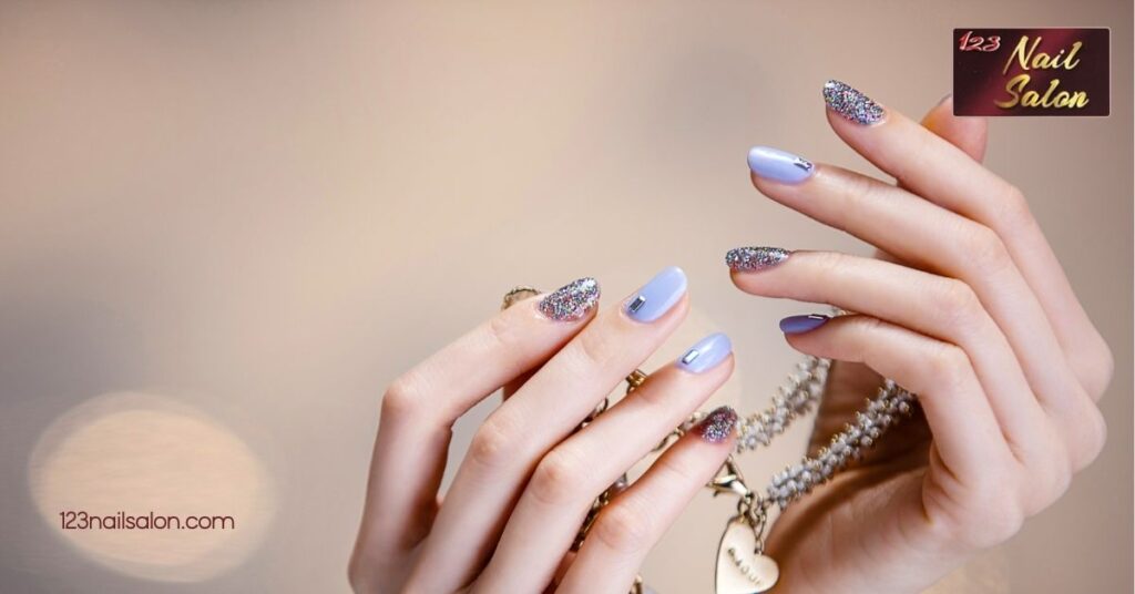 Fresh January Nail Ideas: Sparkle and Style Your Way into the New Year 2 Frosty Blue and Silver Designs