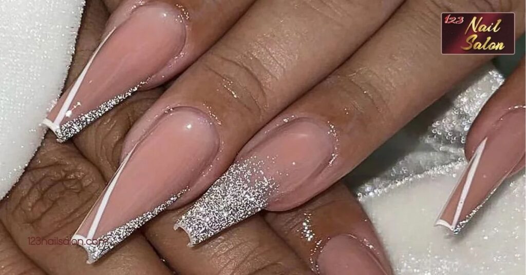 20 Stunning Stiletto Nail Art Ideas to Elevate Your Manicure Game 11 Glitter Stiletto Nails
