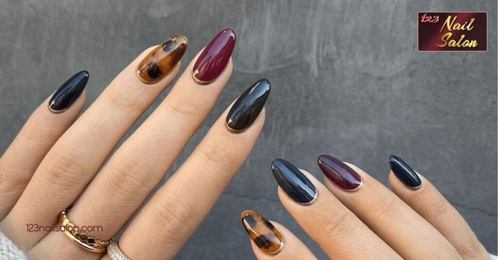 10 Creative Holiday Nail Ideas to Shine Bright at Your Next Festive Gathering 7 Jewel Tone Accents