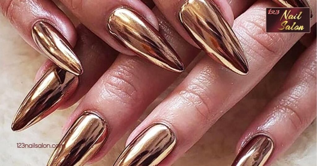 20 Stunning Stiletto Nail Art Ideas to Elevate Your Manicure Game 12 Metallic Finish Stiletto Nails