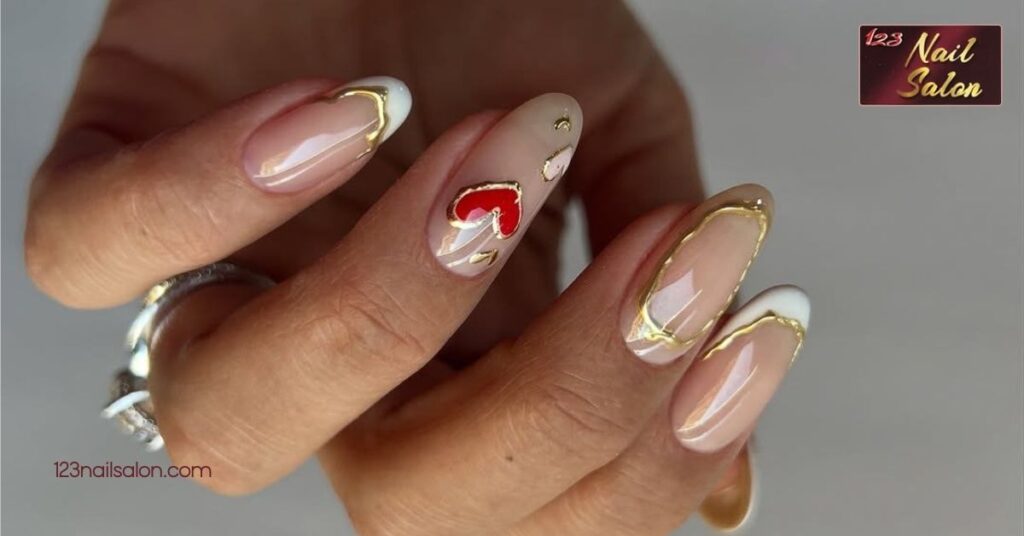 10 Festive Christmas Acrylic Nail Ideas to Sparkle This Holiday Season 6 Metallic Gold and Silver Accents