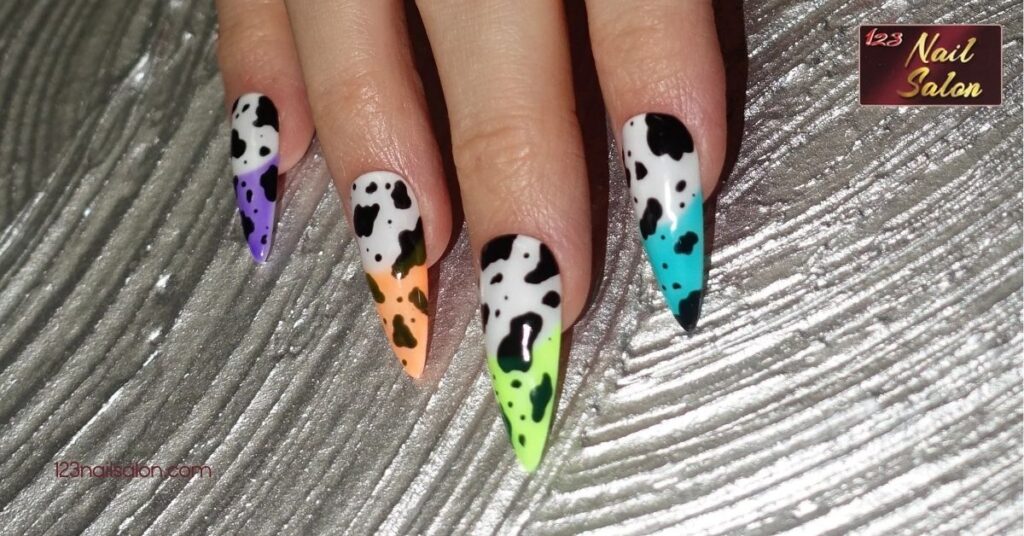 10 Fun Cow Print Nail Ideas to Make Your Manicure Stand Out 5 Neon Cow Print Nail Designs