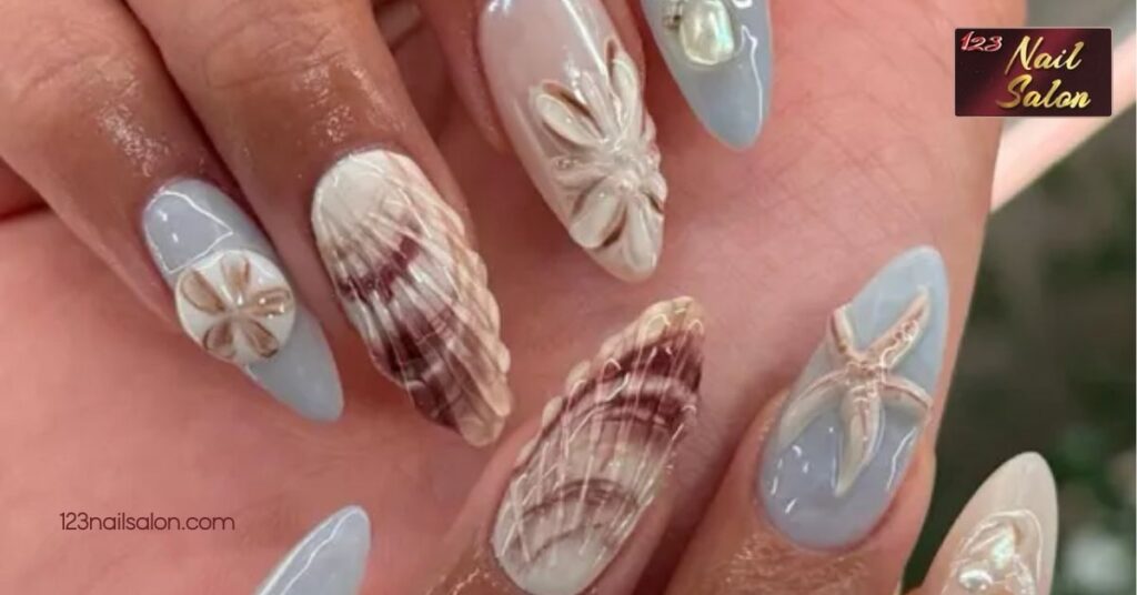 10 Stunning Beach Nail Ideas to Elevate Your Summer Style 5 Shell and Starfish Accents