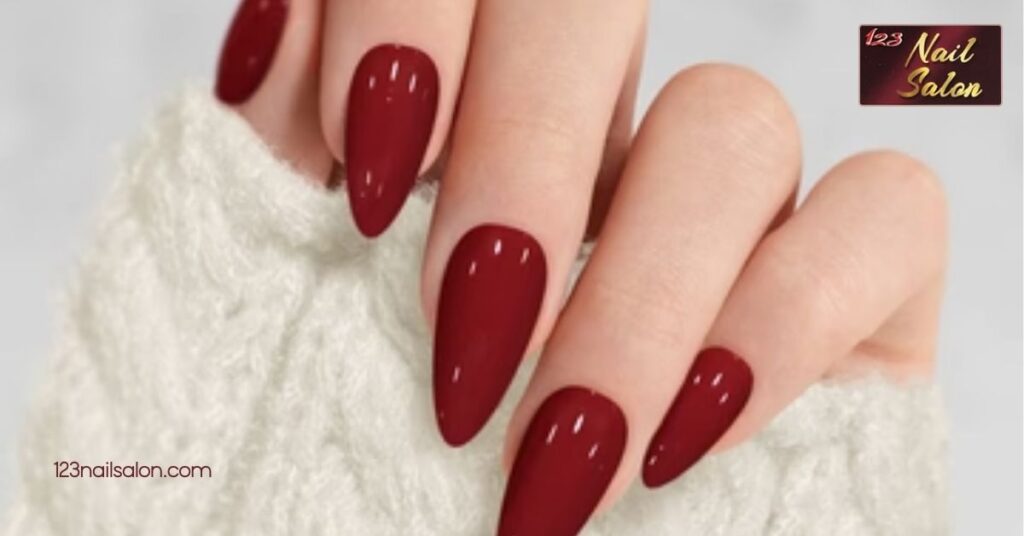 10 Creative Holiday Nail Ideas to Shine Bright at Your Next Festive Gathering 2 Solid Red Elegance