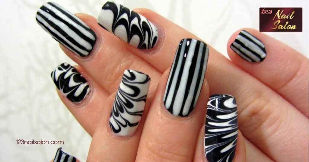 Stunning Nail Art Ideas in Black and White: Elevate Your Style Today 2 Striped Patterns