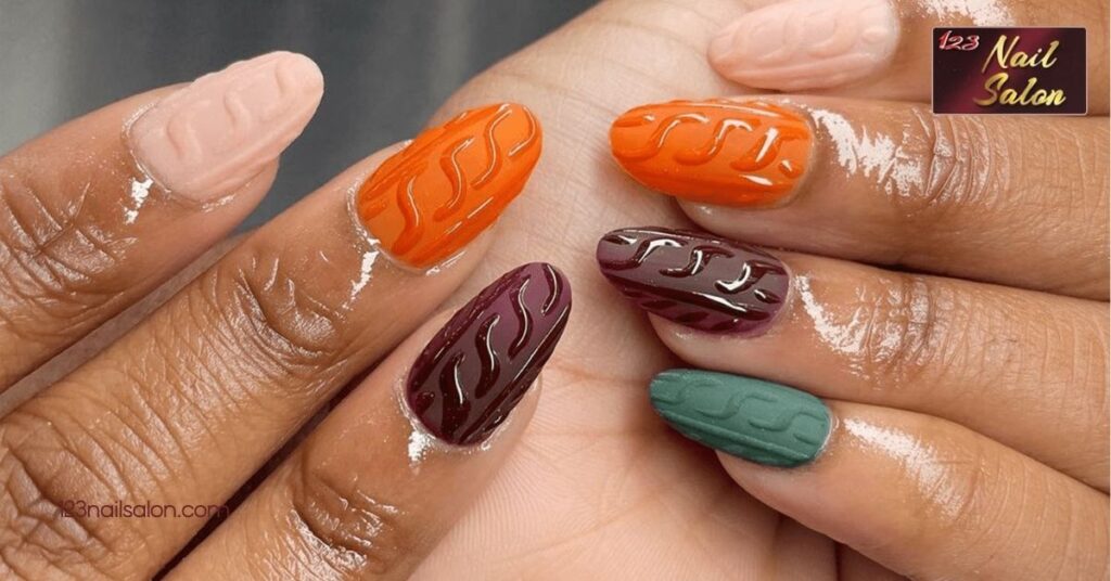 Chic Nail Ideas for Winter: Embrace the Season with Stunning Designs and Colors 7 Sweater Pattern Nail Art