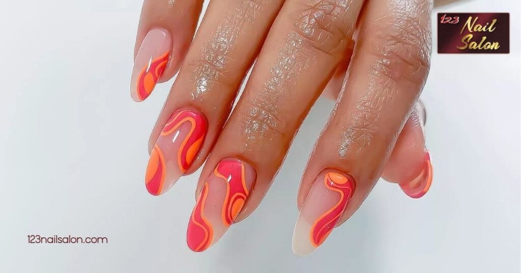 10 Trendy Spring Nail Color Ideas to Refresh Your Look This Season 5 Vibrant Coral and Tangerine