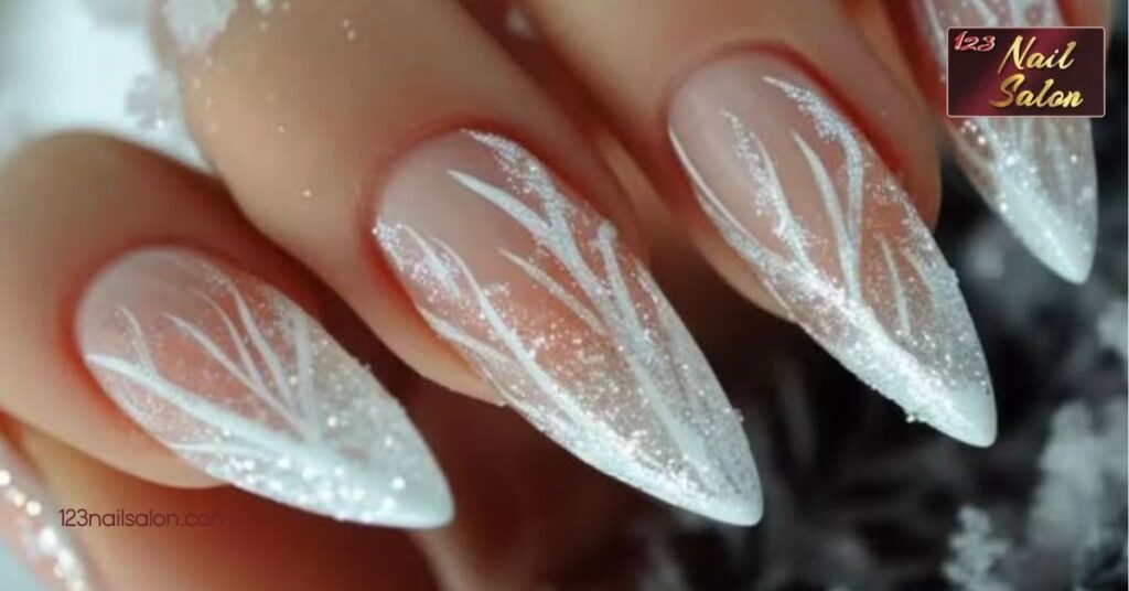 20 Stunning Stiletto Nail Art Ideas to Elevate Your Manicure Game 10 Winter Wonderland Stiletto Nails